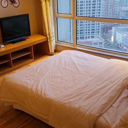 Dalian Yidian Yijing Huayuan Apartment Habitación foto