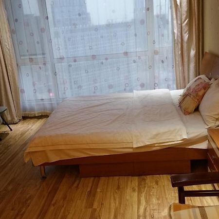 Dalian Yidian Yijing Huayuan Apartment Habitación foto