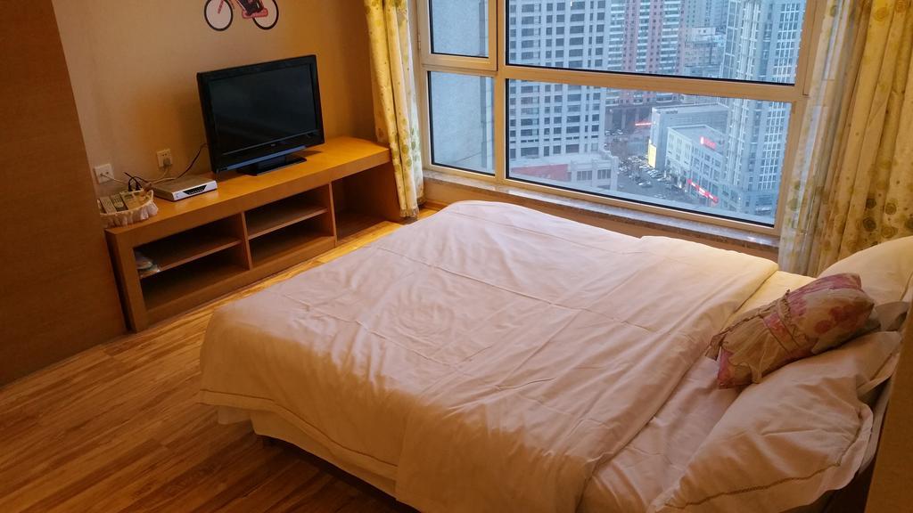 Dalian Yidian Yijing Huayuan Apartment Habitación foto